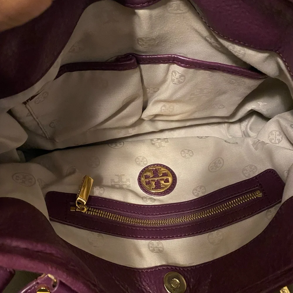 Tory Burch purple bag.